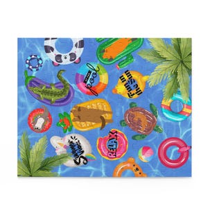 May include: A colorful puzzle featuring various inflatable pool floats. The floats include a panda, cactus, alligator, donut, turtle, and more. The puzzle has a blue water background and palm leaves.