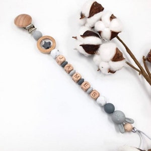 Personalized gray rabbit pacifier clip in silicone and beech wood