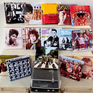 Disques pare-chocs des années 60 et tourne-disque - comprenant 16 albums avec inserts de disque