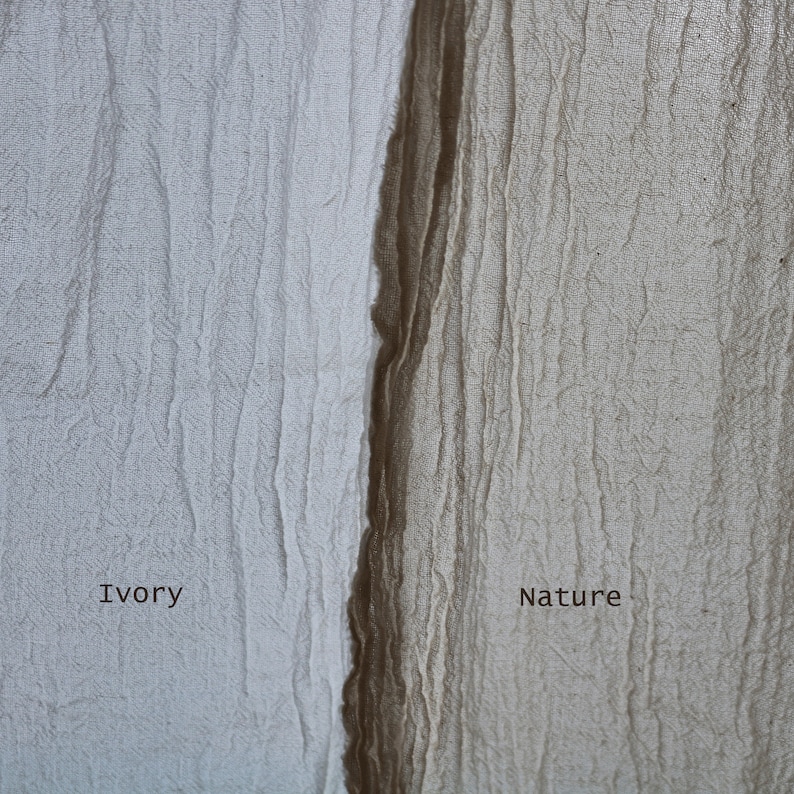 May include: Close-up of two fabric swatches, one ivory and one brown. The ivory swatch is labeled "Ivory" and the brown swatch is labeled "Nature".
