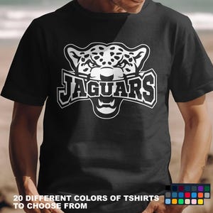 Jaguars graphic T-shirt team spirit apparel school pride logo tee football fan game day shirt unisex sports mascot design custom print