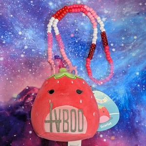 Custom strawberry TVBOO plush with Clip-On Kandi necklace, reflective