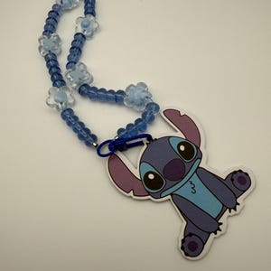 Character car air freshener -  stitch air freshener - clear string with round and flower shaped blue beads - blue clip on stretchy string