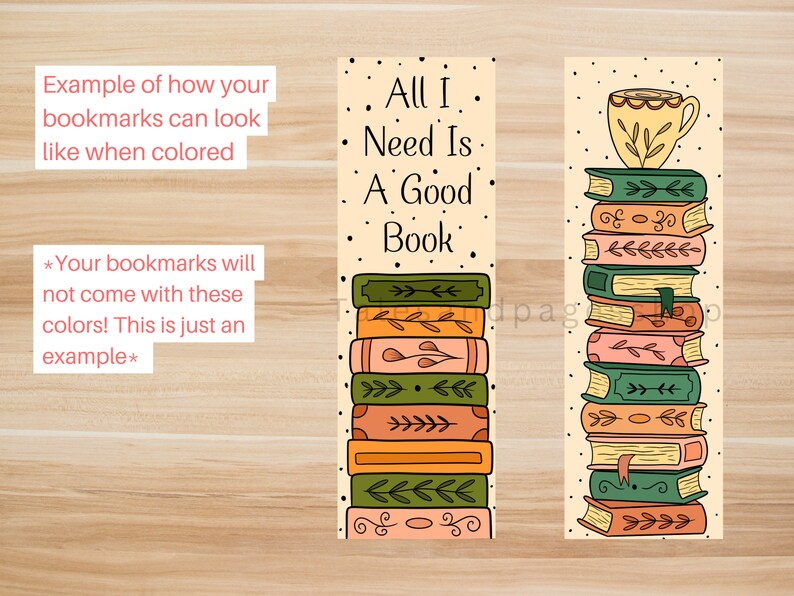 May include: Two illustrated bookmarks with a stack of books and the text "All I Need Is A Good Book". The bookmarks are on a woodgrain background.