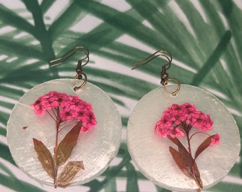 Bohemian handmade capiz shell earrings with real pressed pink flowers.