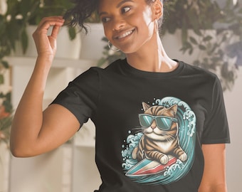 May include: A black t-shirt with a graphic of a cat wearing sunglasses and riding a surfboard on a wave.