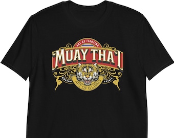May include: Black t-shirt with a vintage-style logo for Muay Thai, featuring a tiger head, the words "Muay Thai", and the phrase "Art of 8 Limbs".
