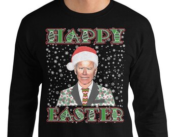 May include: A black long-sleeved shirt with a Christmas-themed design featuring a person wearing a Santa hat and a green and red patterned suit. The text "HAPPY EASTER" is printed on the shirt.