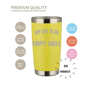 May include: A yellow 20 ounce stainless steel tumbler with the text "My life is an empty shell" and a battery icon. The tumbler is double-walled, vacuum insulated, and sweat-free. It keeps drinks cold for 9 hours and hot for 3 hours.