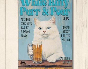 May include: A rectangular sign with a white cat holding a beer mug. The sign reads "White Kitty Purr & Pour" with additional text: "Another cold beer is just a meow away." The sign has a blue background and a wooden-like base.
