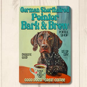 May include: A rectangular sign featuring a German Shorthaired Pointer dog with the text "German Shorthaired Pointer Bark & Brew Coffee Shop." The sign includes a coffee cup and the phrases "Doggone Good" and "Good Dogs Great Coffee."
