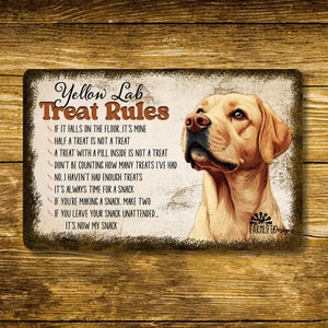 May include: Rectangular metal sign with a yellow Labrador illustration and the text "Yellow Lab Treat Rules". The rules include statements like "It's always time for a snack" and "If it falls on the floor, it's mine."