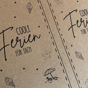 May include: Two brown paper cards with black line art illustrations of beach-themed icons, including a smiling sun, ice cream cones, a sandcastle, and a beach umbrella. The text "COOLE Ferien F&Uuml;R DICH" is written in a script font.