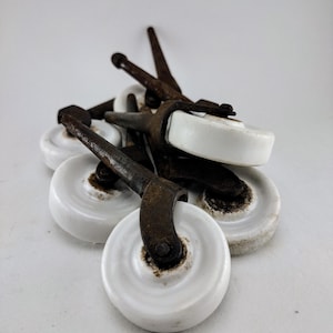 Set of Seven Antique Porcelain Wheels - furniture wheels
