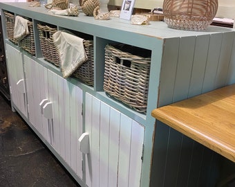 Coastal storage cabinet with baskets