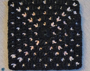Mosaico sovrapposto con motivo quadrato all'uncinetto con fuochi d'artificio scintillanti