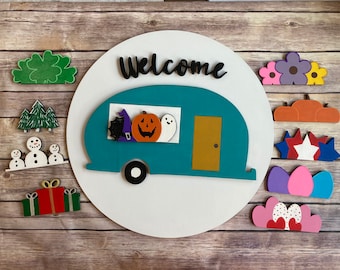 Interchangeable camper door hanger