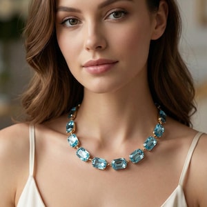 Anna Wintour Aquamarine Crystal Necklace. Lobster Clasp or Magnetic Clasp Available. Matching Earrings.