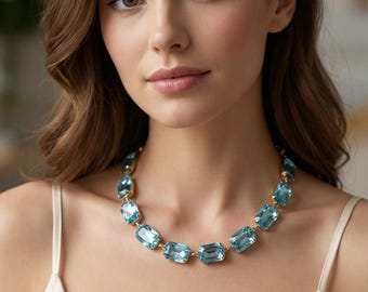 Anna Wintour Aquamarine Crystal Necklace. Lobster Clasp or Magnetic Clasp Available. Matching Earrings.