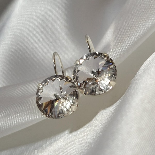 12 mm round Swarovski Crystal Earrings. Lever back.