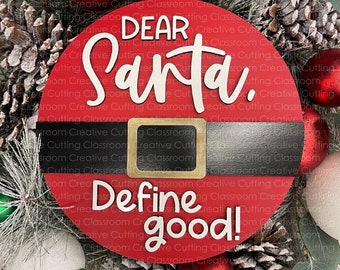 May include: Red and white wooden Christmas ornament with a Santa belt design. The ornament says "Dear Santa. Define good!"