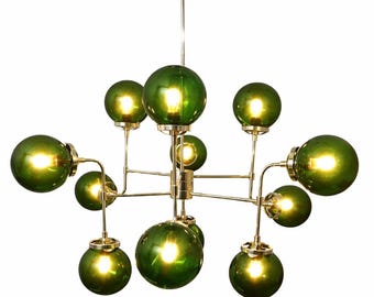 Contemporary Green Glass and Gold Chandelier with Geometric Arms and Multiple Spheres