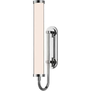 May include: A chrome wall-mounted light fixture with a cylindrical frosted glass shade. The fixture has a curved arm and a rectangular backplate.