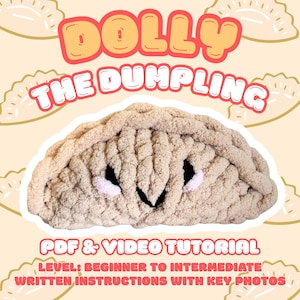 May include: A beige, dumpling-shaped cushion with black and pink details, with the text "DOLLY THE DUMPLING". The image also includes the text "PDF & VIDEO TUTORIAL" and "LEVEL: BEGINNER TO INTERMEDIATE".