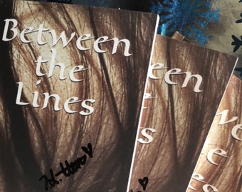 Between the Lines Signed Poetry Book by T.L. Hein