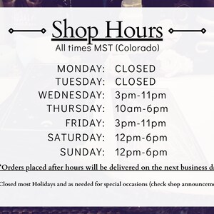 May include: A white sign with black text listing shop hours. The sign says "Shop Hours" and lists the hours of operation for each day of the week. The hours are listed in Mountain Standard Time (MST). The sign also states that orders placed after hours will be delivered on the next business day.