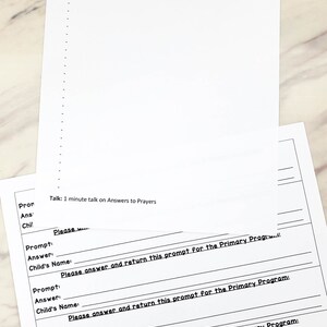 May include: A white paper document titled Fill-in Parts Outline &ndash; A Child's Prayer, featuring a scripture reference, a prompt, and a list of lines. Beneath it, a second sheet contains multiple sections with fields for Prompt, Answer, and Child's Name.