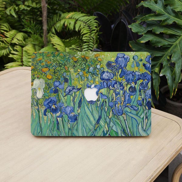 May include: A laptop case displaying a painting of blue irises in a field, with green foliage and yellow flowers. The artwork is a vibrant display of colour and texture, with a white Apple logo visible.