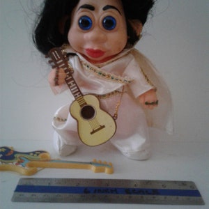 ELVIS CELEBRITY SPOOF Doll, troll like, excellent condition with display case and extra guitar in White Suit