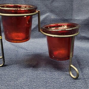 Red Translucent Glass Candle Holder with Black Wire Frame and Two Individual Candle Slots