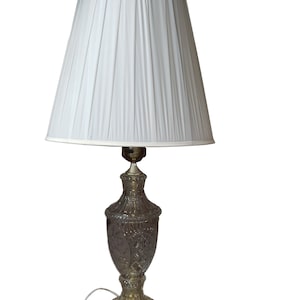 Clear Glass Lamp with Golden Metal Bottom and Intricate Etched Designs