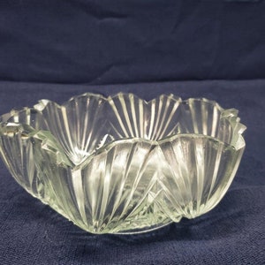 Beautiful Thick Cut Glass Geometric Bowl with Intricate Designs and Waved Edge