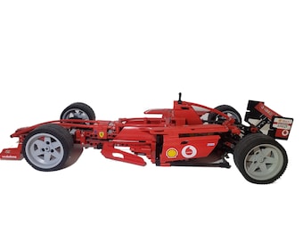 Ferrari de Fórmula 1 rojo coleccionable a escala 1:10