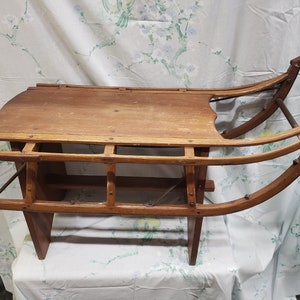 Handcrafted Vintage Bentwood Sled Secured onto Wooden Stand