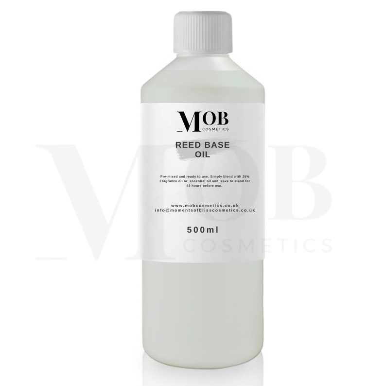 May include: A clear plastic bottle with a white label that says "MOB Cosmetics Reed Base Oil". The label also includes instructions for use and contact information. The bottle contains 500 ml of oil.