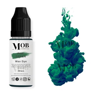 May include: A 10 ml bottle of pine green wax dye. The bottle is labeled "MOB Cosmetics Pine Green Wax Dye". The dye is a concentrated liquid dye suitable for all wax types. The bottle is on a white background.