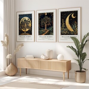 Set of three William Morris celestial nature posters featuring a glowing moon behind a tree, a vibrant fruit tree under a full moon, and a delicate feather against a starry sky. Perfect for nature and celestial wall art lovers.