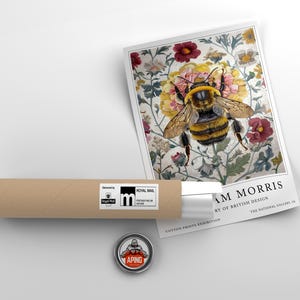 May include: A vintage poster featuring a detailed illustration of a bumblebee surrounded by flowers. The poster is titled "William Morris, History of British Design, Cotton Prints Exhibition, The National Gallery, London."