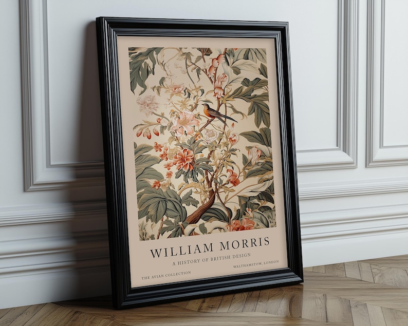 May include: A framed poster featuring a vintage illustration of a bird perched on a branch of a flowering tree. The poster is titled "William Morris: A History of British Design" and includes the text "The Avian Collection" and "Walthamstow, London".