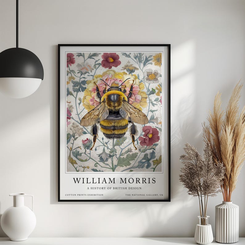 May include: A poster featuring a bee surrounded by flowers. The poster is titled "William Morris: A History of British Design" and includes the text "Cotton Prints Exhibition" and "The National Gallery, UK".
