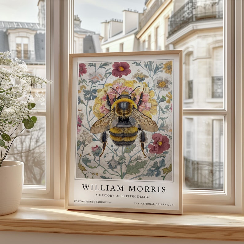This William Morris Bee print features a vibrant bee centered on a detailed floral background, showcasing Art Nouveau elements in a vintage design. The Giclee print captures rich textures and intricate details, perfect for home décor or gifting.