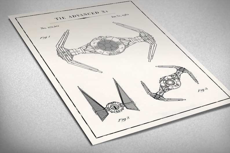 May include: A black and white line drawing of a TIE Advanced X1 starfighter, a fictional spacecraft from the Star Wars universe. The drawing is labeled "TIE Advanced X1" and includes the patent number "No. 978,431".