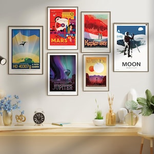 May include: Six framed posters with colorful illustrations of planets and celestial bodies. The posters feature text such as "Mars", "Kepler-186f", "Moon", "HD 40307g", "Jupiter", and "Kepler-10b".