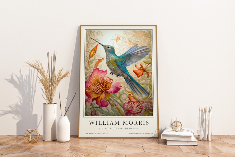 A print featuring a hummingbird and floral elements, designed in the style of William Morris, offering a blend of nature and historical British art for wall decor.