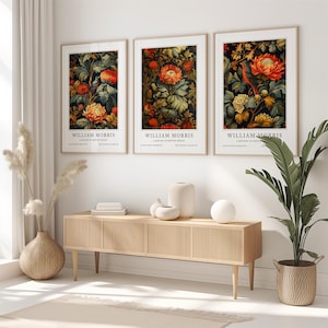 William Morris Botanical Print showcasing bold orange flowers and intricate leafy details, designed in a vintage style. This bird and floral print brings timeless beauty and nature-inspired charm to any living space
