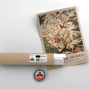 May include: A vintage poster featuring a floral design with a bird perched on a branch. The poster is titled "William Morris" and includes the text "History of British Design" and "Walthamstow, London".